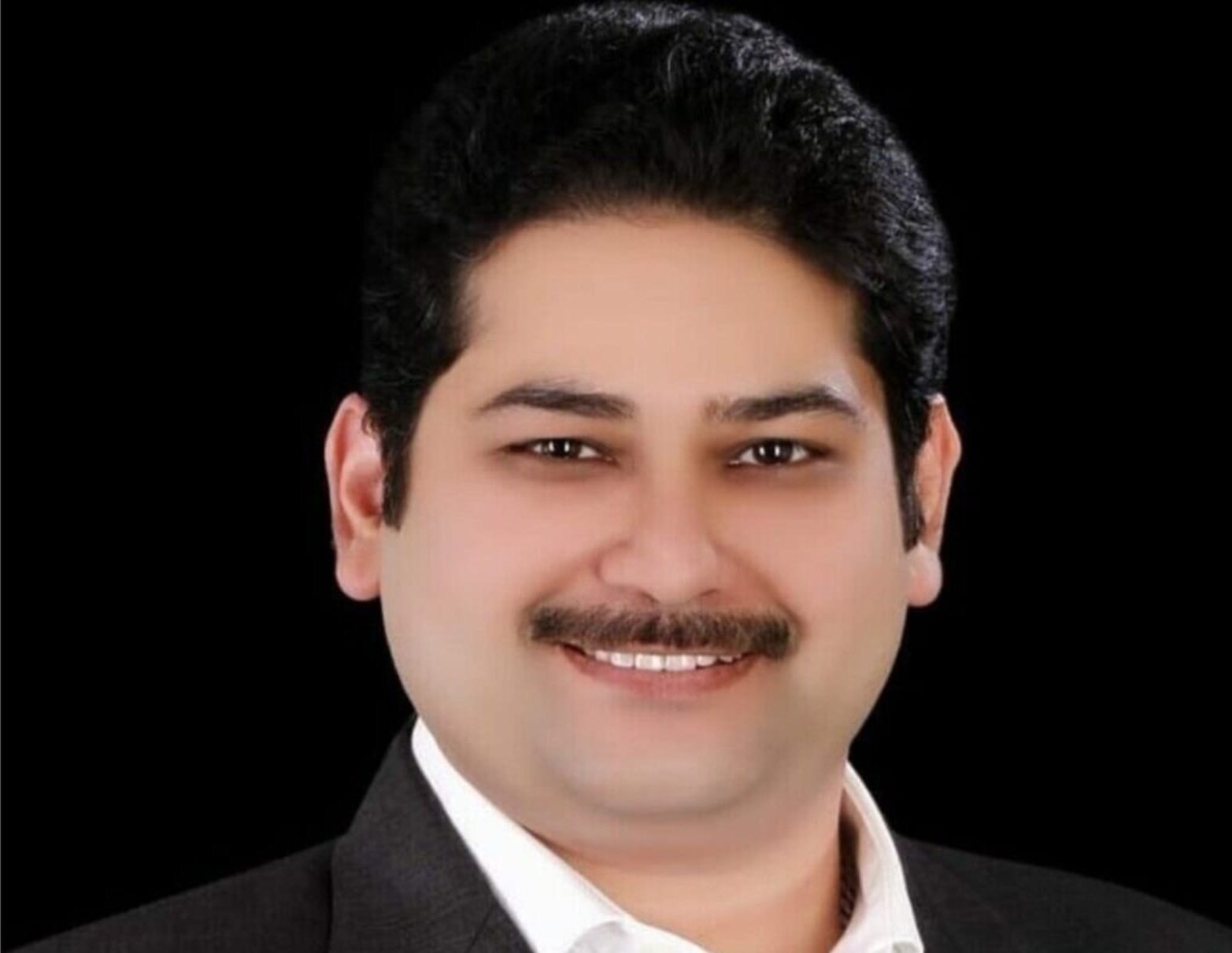 Portrait of Manish Kapoor, AI executive intelligence leader.